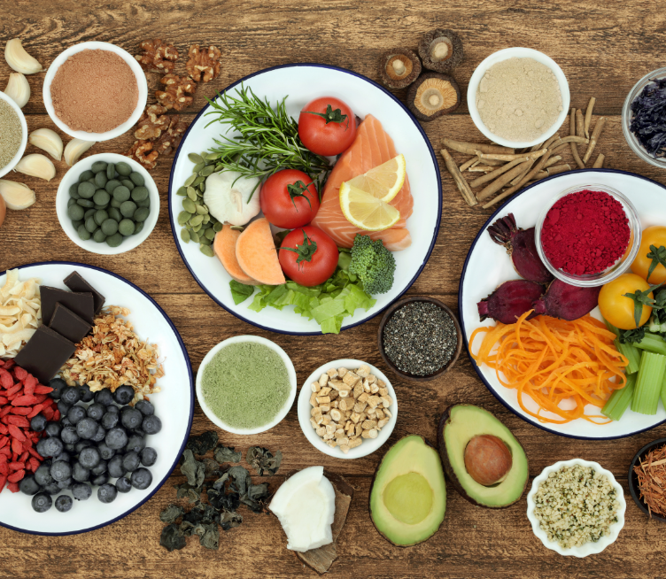 Fresh and Whole Foods laid out on a table